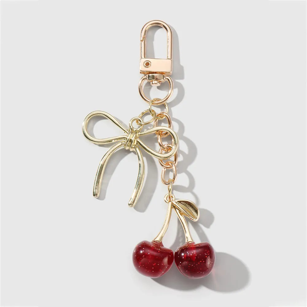 Kersen bag chain met strik - Goud en rood