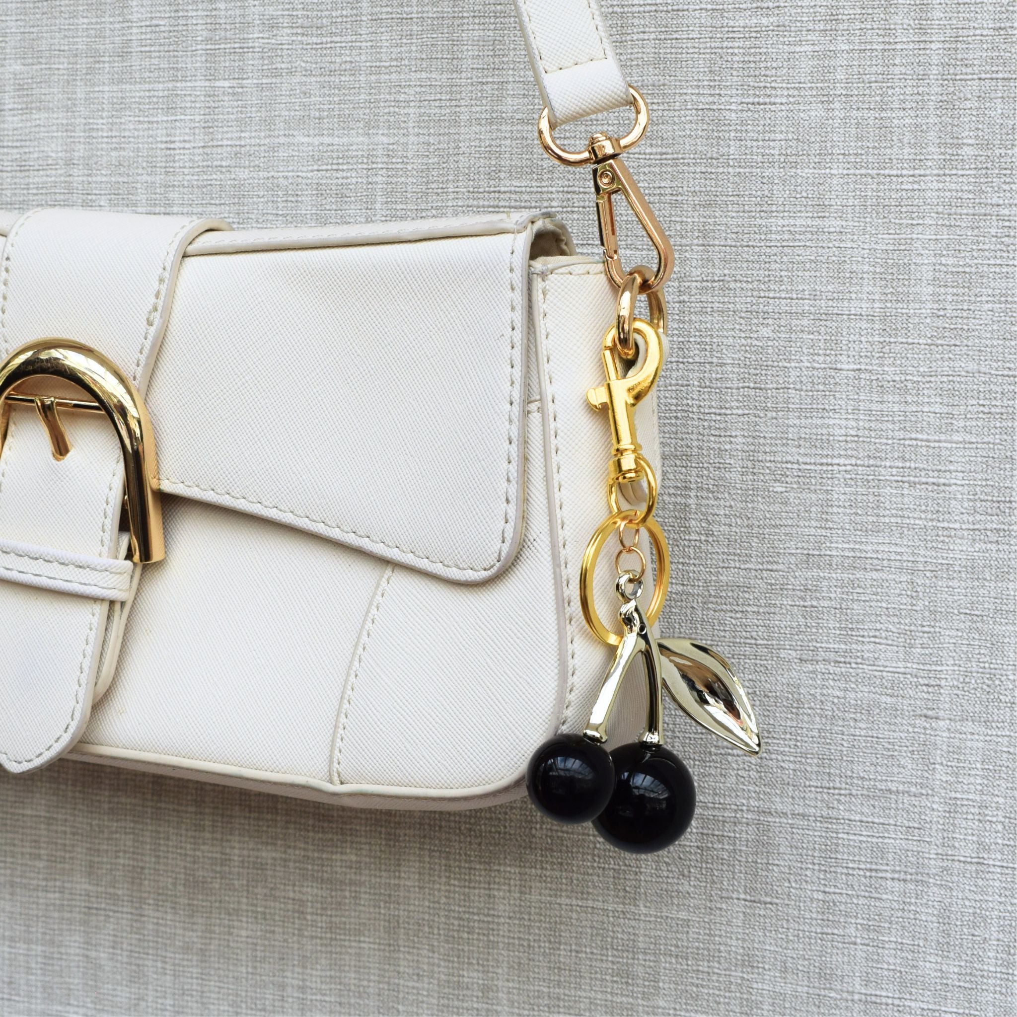 Kersen bag chain - Goud en zwart