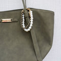 Parel en bloem bag chain - Goud, zwart en parelmoer