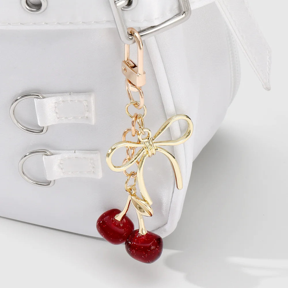 Kersen bag chain met strik - Goud en rood